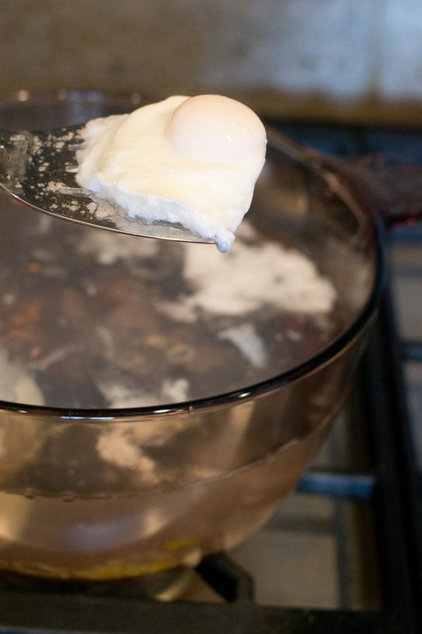 Removing poached eggs from water