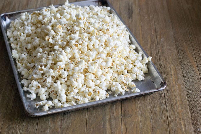 While it's coming up to temperature, put your popcorn on a big pan.