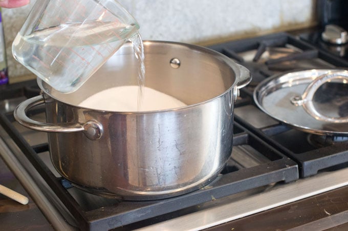 Measure sugar, water, dark corn syrup, lemon juice and salt into a 5 quart heavy-bottomed sauce pan.