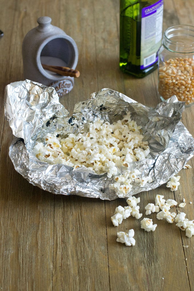 danger: jiffy pop on open campfire, INGREDIENTS: Popcorn, p…