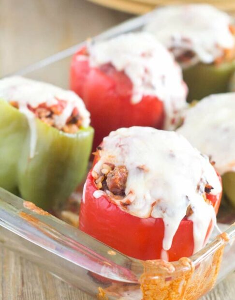 Stuffed peppers with melted cheese on top.