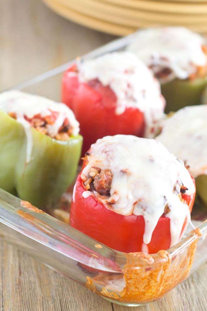 Classic Stuffed Bell Peppers in a glass baking dish, topped with melted cheese.