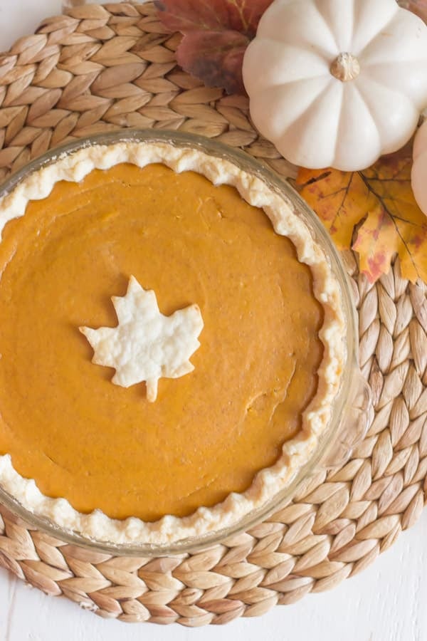 Pumpkin Pie with Leaf shaped piece of crust n the center.