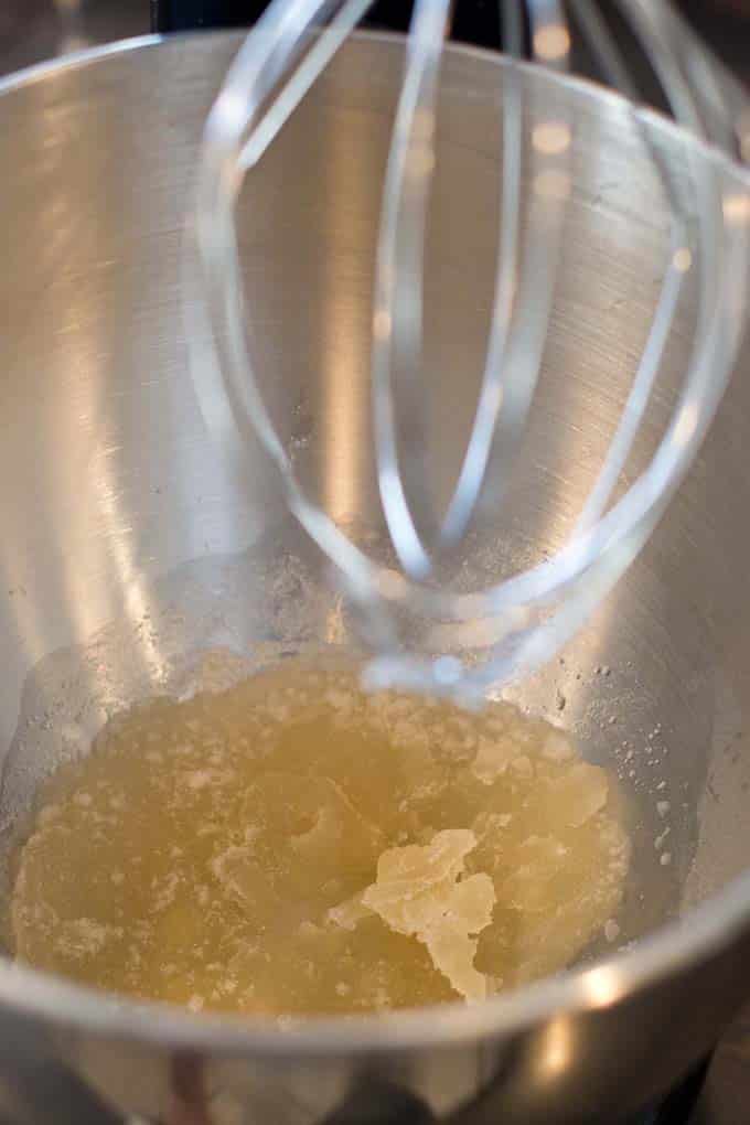 Bloomed gelatin in the bowl of a stand mixer.