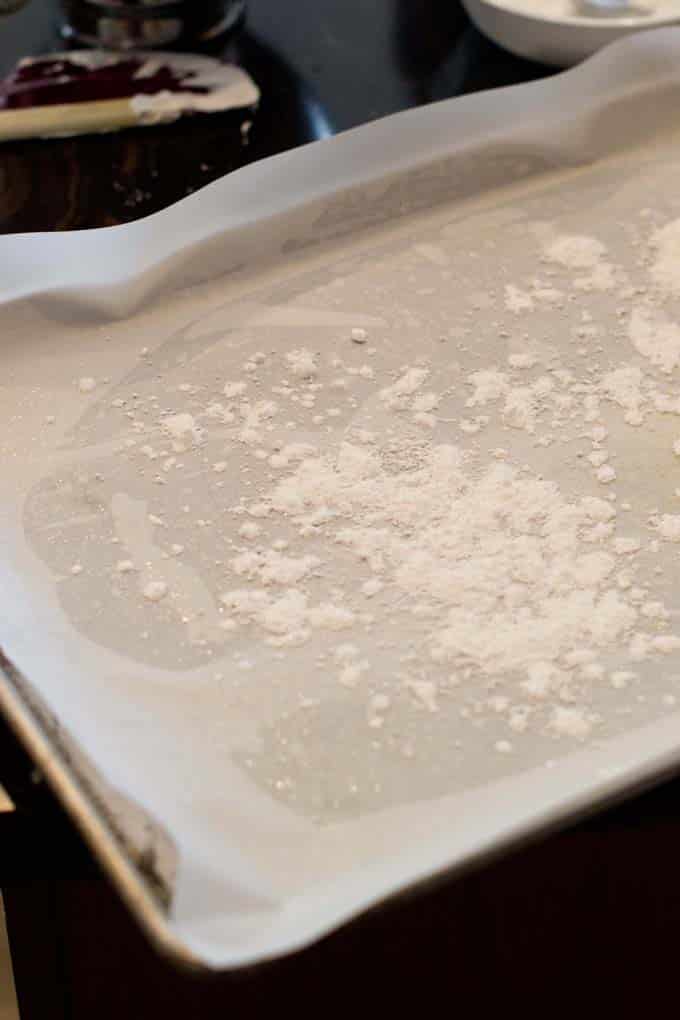 Baking sheet sprinkled with cornstarch mixture 