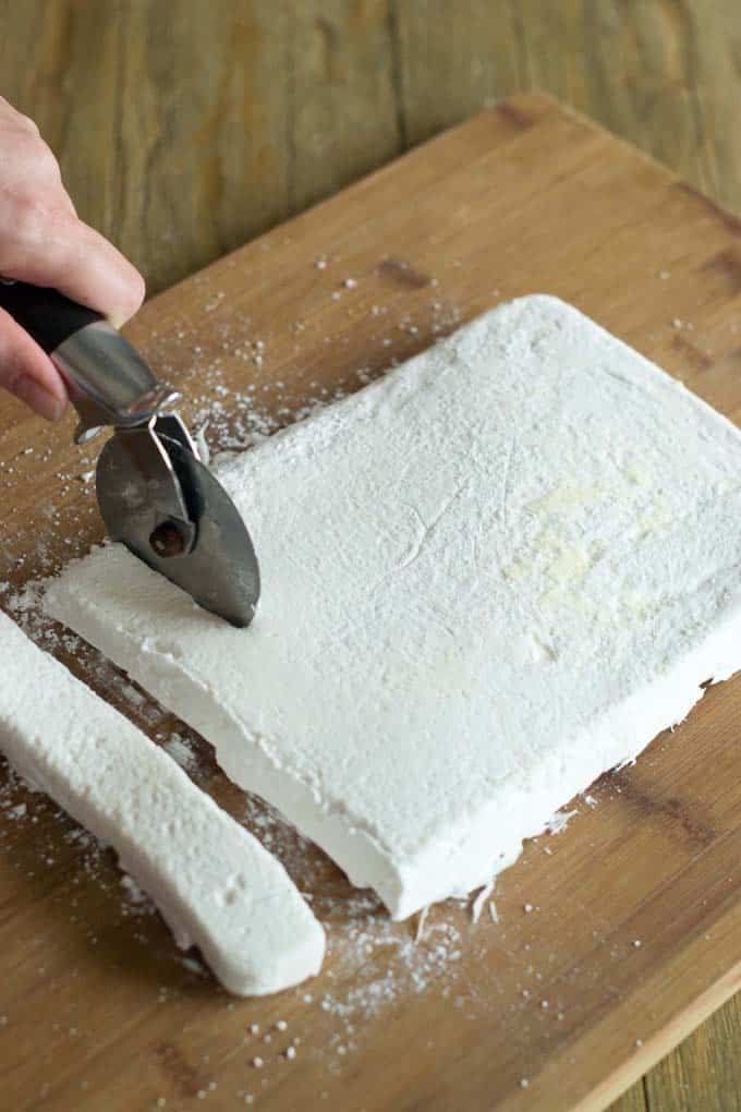 Cut strips of marshmallow with pizza cutter.