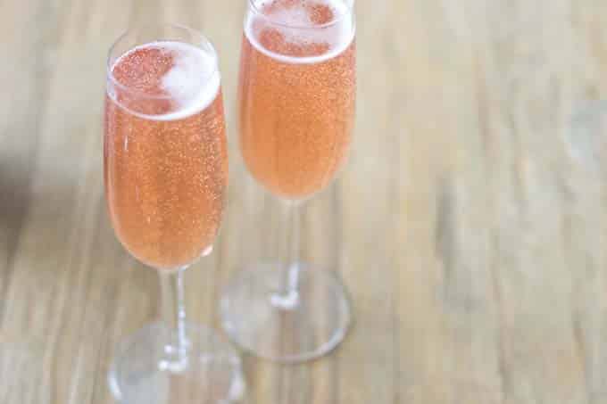 Kir Royale combines Champagne and a black currant liqueur to make a delectable cocktail. If you're feeling adventurous, we have some cool variations to try as well.