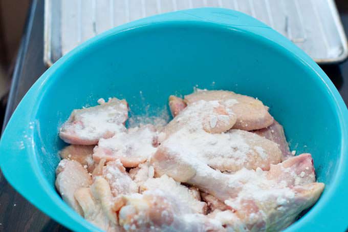 Coating the chicken with baking powder 