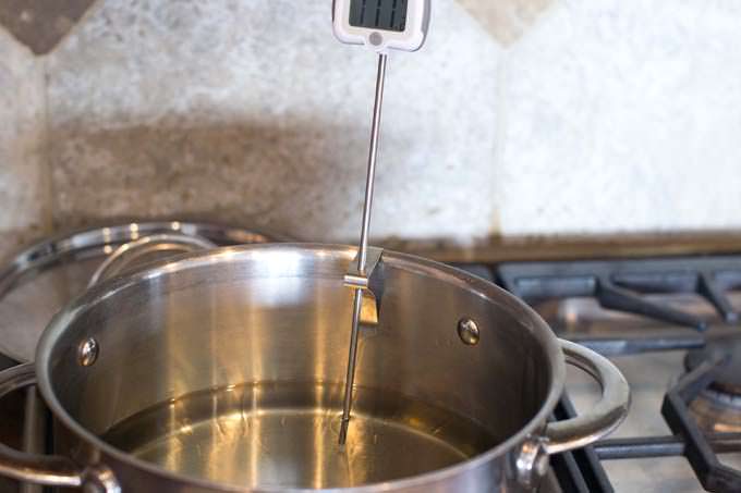 Pour oil in pan