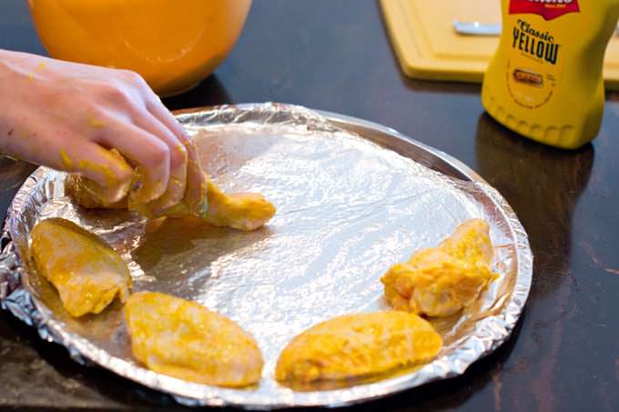 Put chicken wings on pan