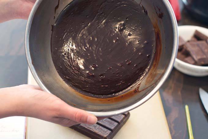 Chilled ganache in metal bowl.