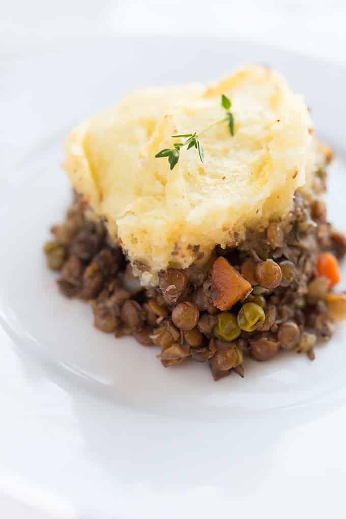Piece of Vegetarian Shepherd's Pie Piece of Vegetarian Shepherd's Pie on a white dish.