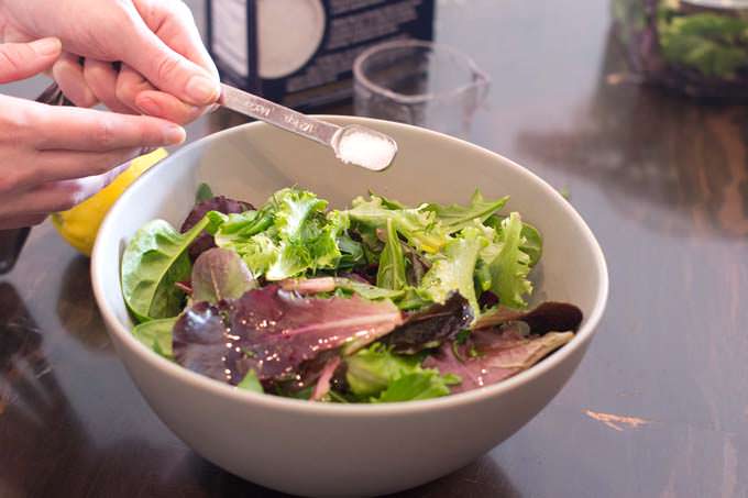 Add coarse salt to the salad