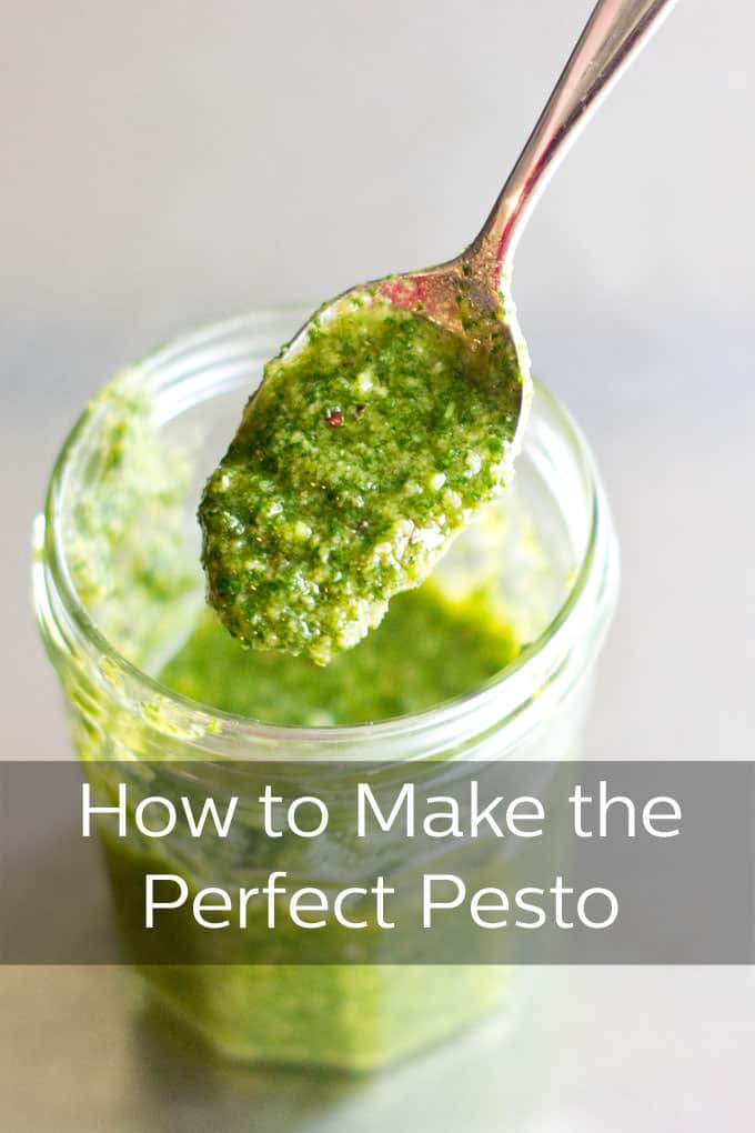 Spoonful of pesto out of a glass jar, with text How to Make the Perfect Pesto