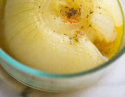 Microwaved onion in glass dish.