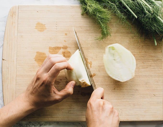 Cut fennel in half