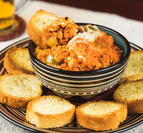 Here's a new spin on pizza. The slow cooker lets you fix this dip and forget it until game time.