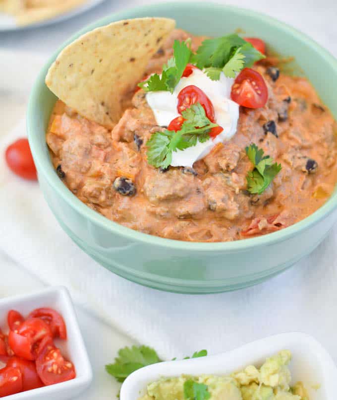 All the flavors of a taco but in a dip. A slow cooker dip. Did somebody say, "Game Day???"