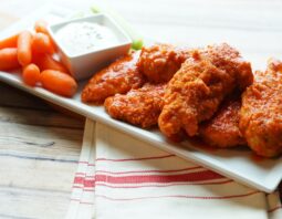Buffalo Chicken Tenders are a classic, but this recipe is for the ultimate baked buffalo chicken tender, with a secret ingredient. You're going to fall in love with these!