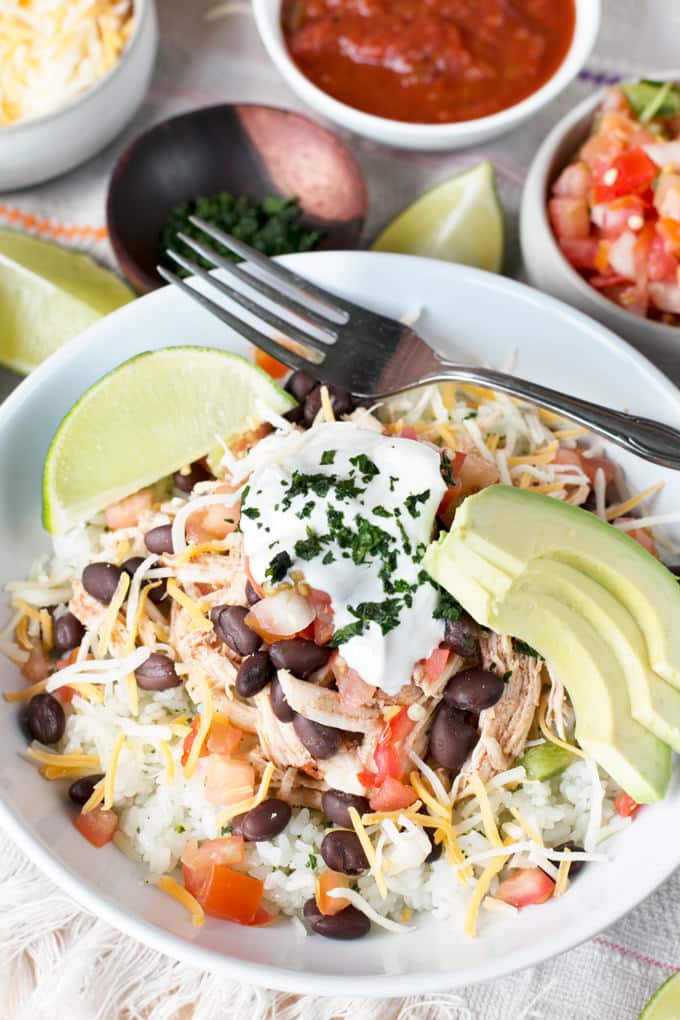 Bye-bye Chipotle. Time to make Chicken Burrito Bowls with the slow cooker.