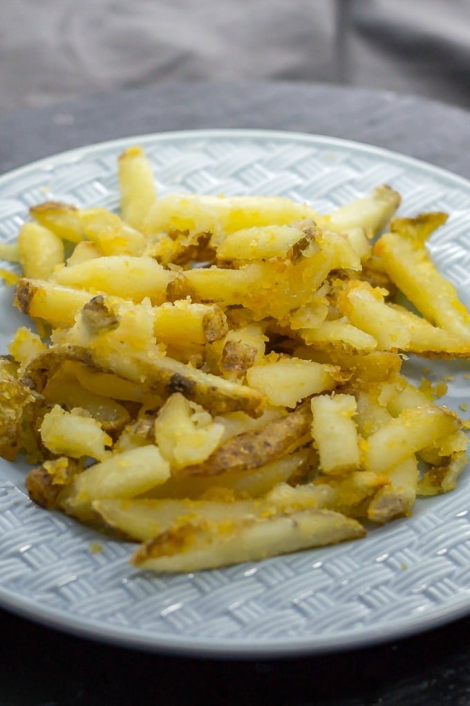 French fries on a light blue plate.