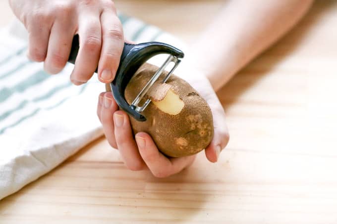 Peeling the Squash, Using a potato peeler seems the best ro…, Sid