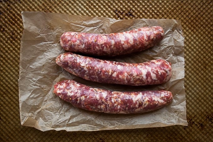 Uncooked Italian sausage links.