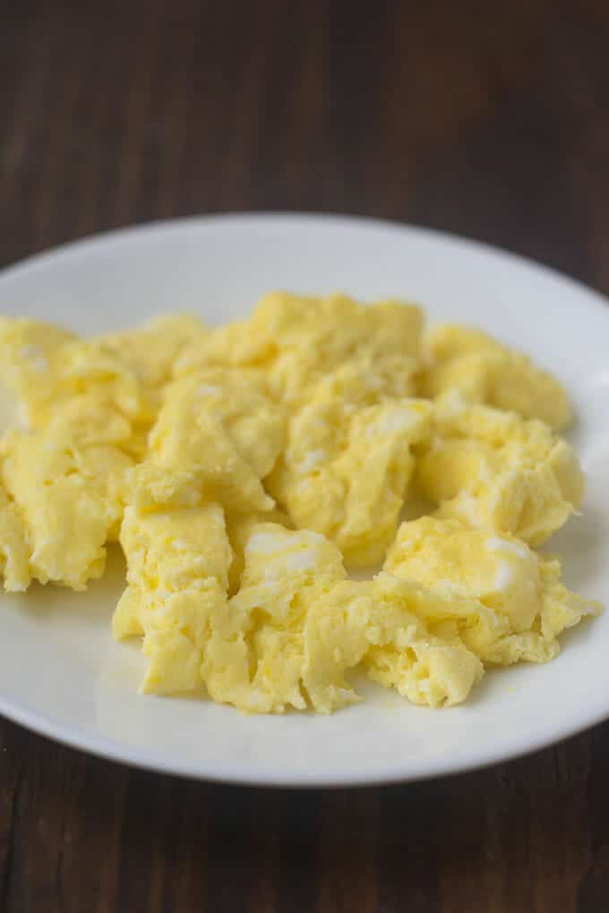 Microwave Scrambled Eggs on a white plate.