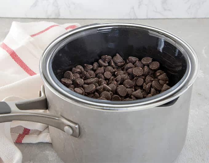 Chocolate chips set up in a double boiler.