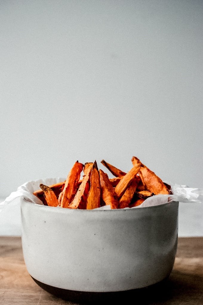 You're gonna love this tip for getting a crispy sweet potato fry and it uses less grease. How's that for a win?