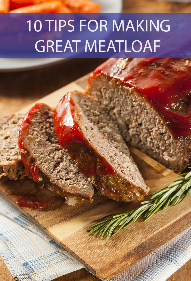 Meatloaf covered in a thick red sauce sitting sliced on a wooden cutting board and garnished with a sprig of rosemary. The banner across the top reads, "10 Tips for Making Great Meatloaf".