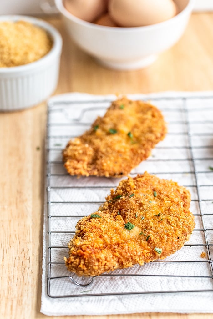 Panko breadcrumbs are the perfect thing to coat chicken in for frying because they crisp up so beautifully without adding too much bready flavoring. A simple egg wash binds it all together for the crispiest fried chicken ever.