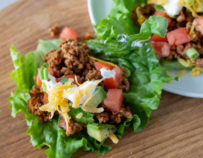 Taco lettuce wrap on a wooden board