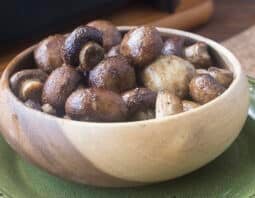 Cooked whole mushrooms in a bowl