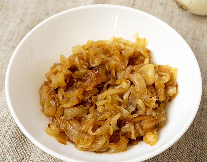 caramelized onions in white bowl