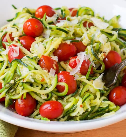 zucchini noodles tossed with tomatoes and herbs