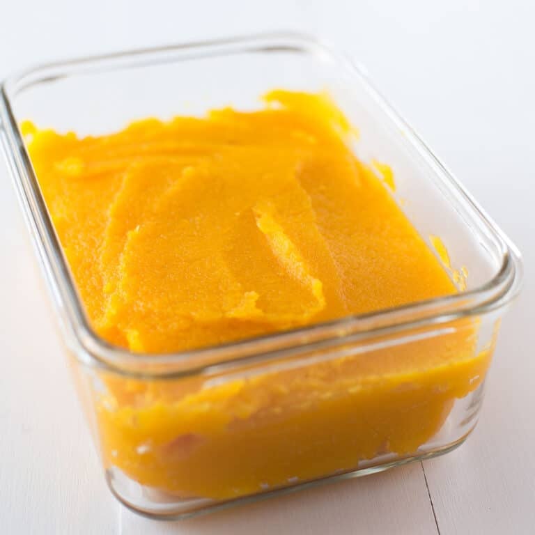 Homemade pumpkin puree in a rectangular glass baking dish