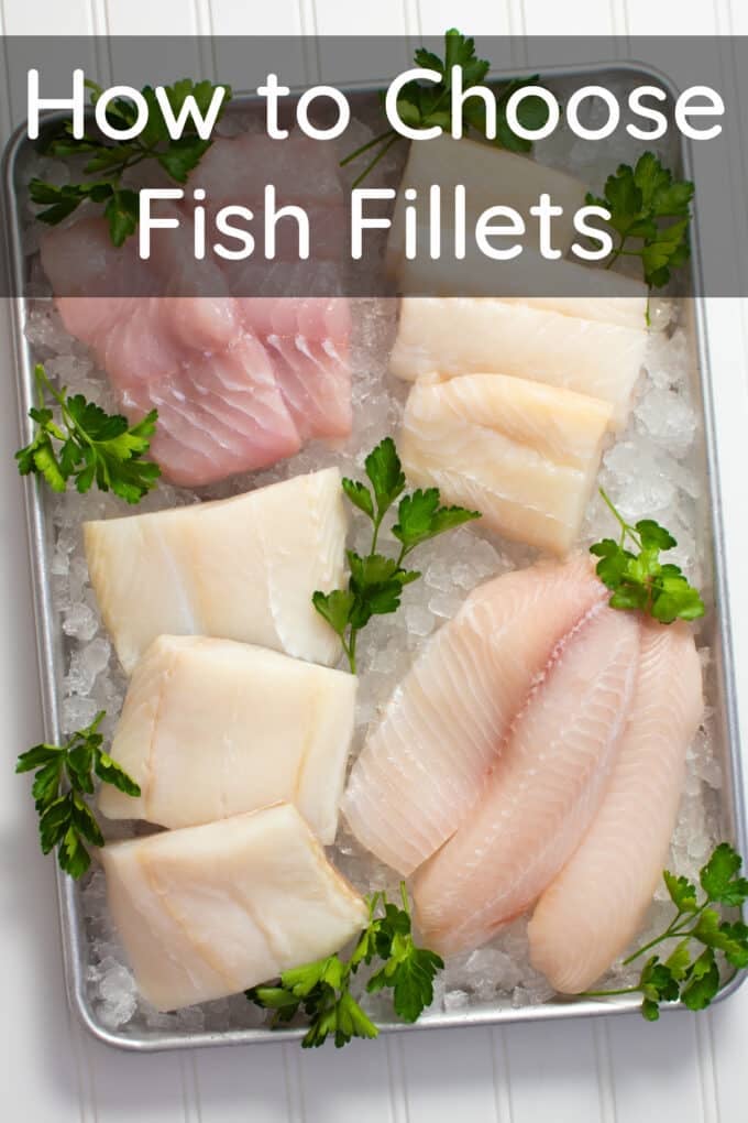 Various types of fish fillets and a whole raw fish.