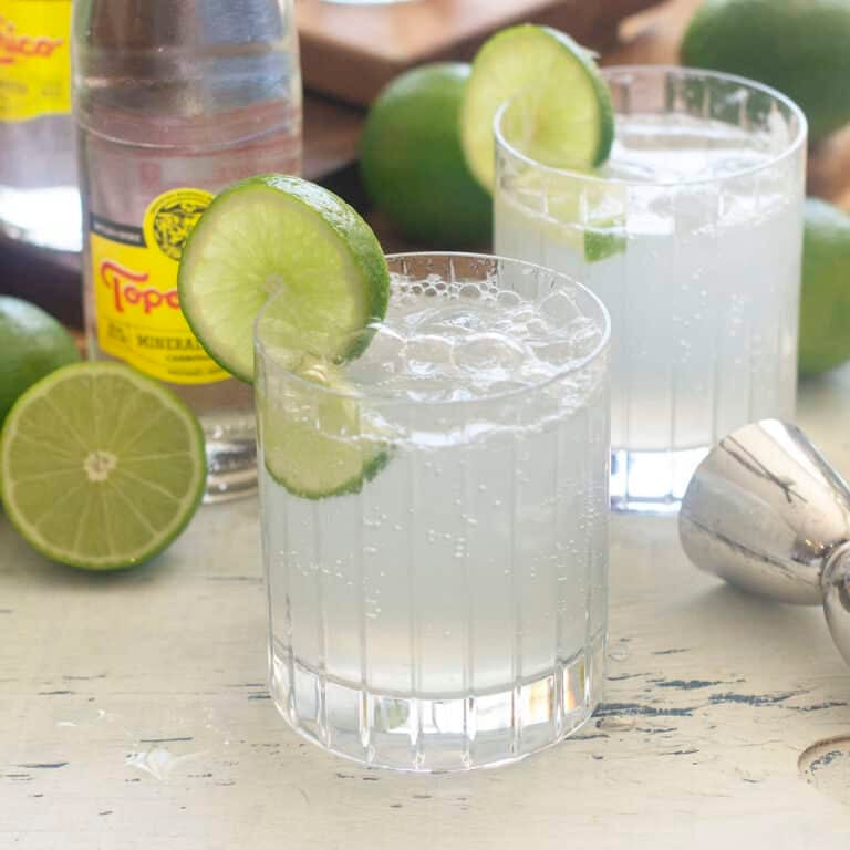 Ranch water cocktail in rocks glass with lime.