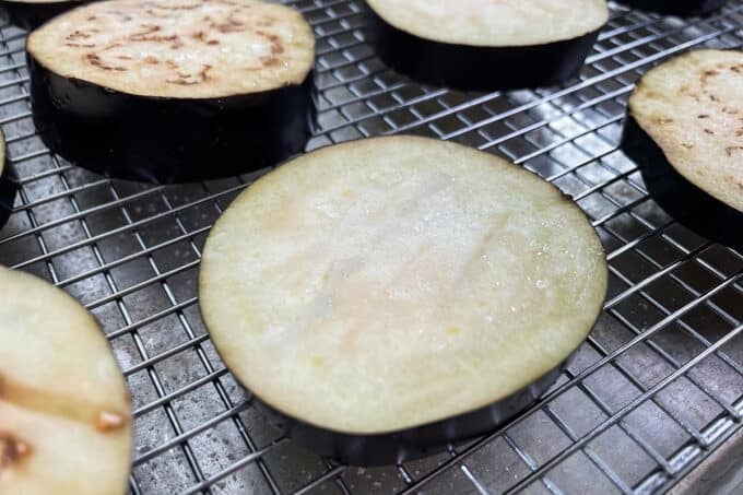 Moisture being drawn out of salted eggplant slice.