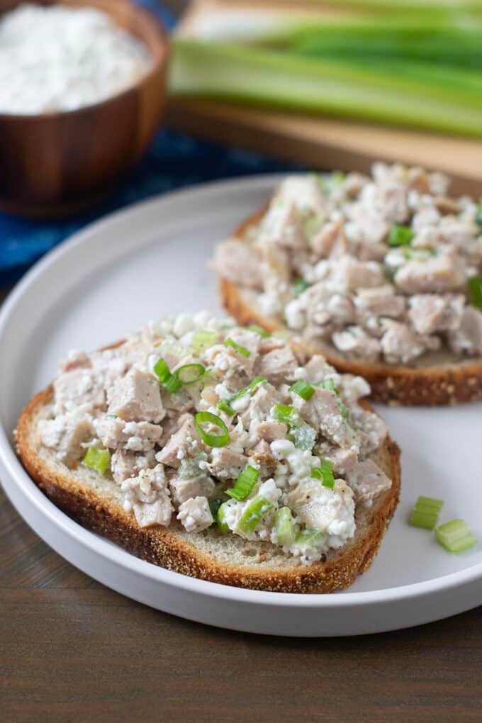 Cottage cheese chicken salad on slices of bread.