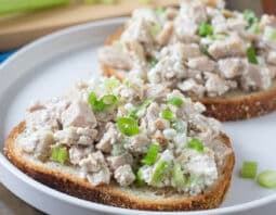 Cottage cheese chicken salad on slices of bread.