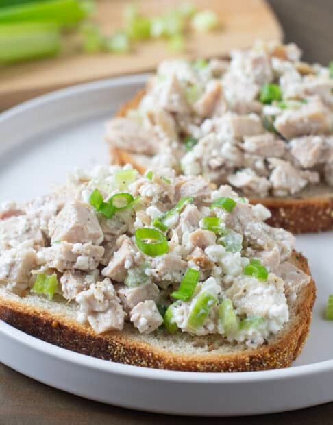 Cottage cheese chicken salad on slices of bread.