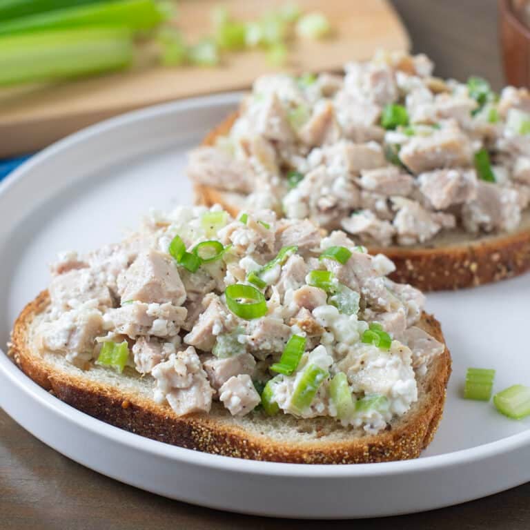 Cottage cheese chicken salad on slices of bread.