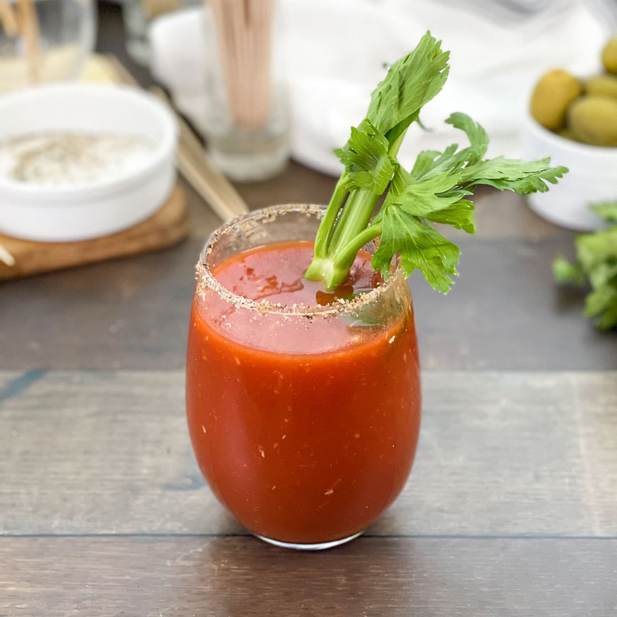 Bloody Mary with spiced rim and celery stick.