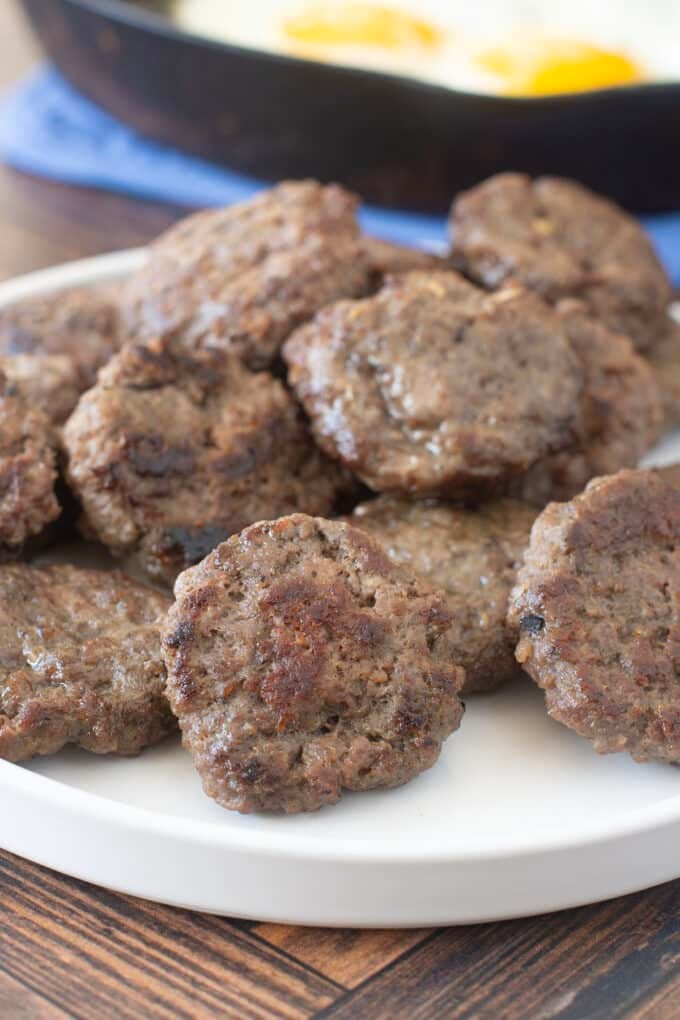 White plate with beef breakfast sausage patties.