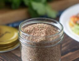 Glass jar of homemade chicken taco seasoning.